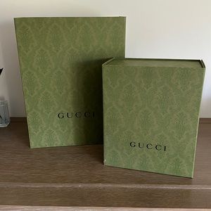 Various sizes of Gucci gift boxes
